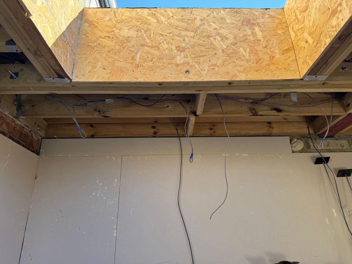 Rooflight upstand boxed out and first-fix wiring dropped